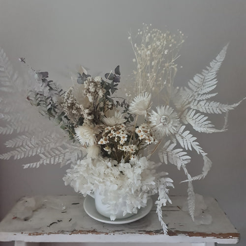 Vintage white teacup arrangement